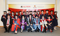 Professor John Dewar (middle at front row), Dr. Ella Chan (third from left at front row) and graduates